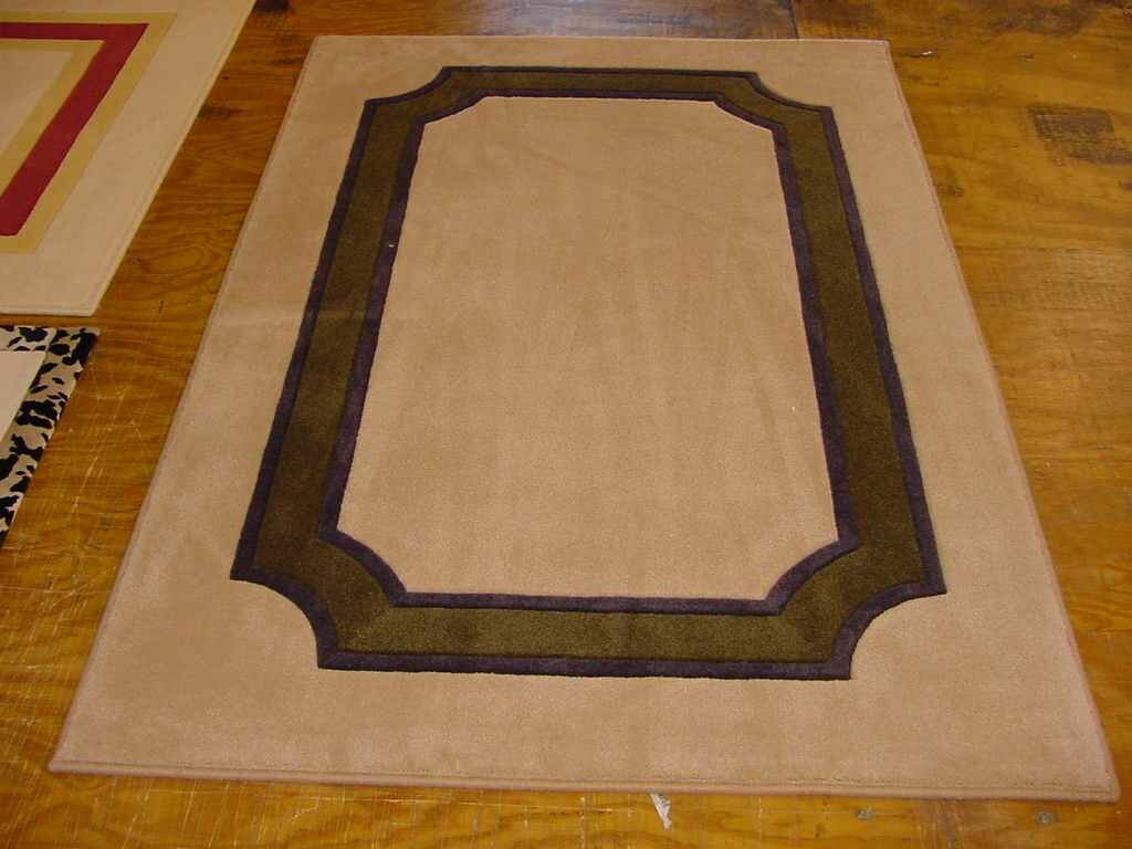 4' X 6' Four border rug with french corners
